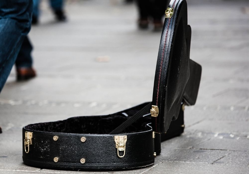 A guitar case on the ground