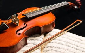 A violin for beginners and a music notes