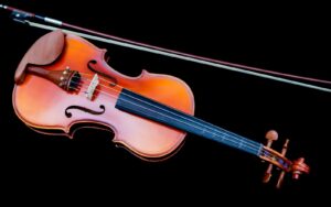 A violin with a black background