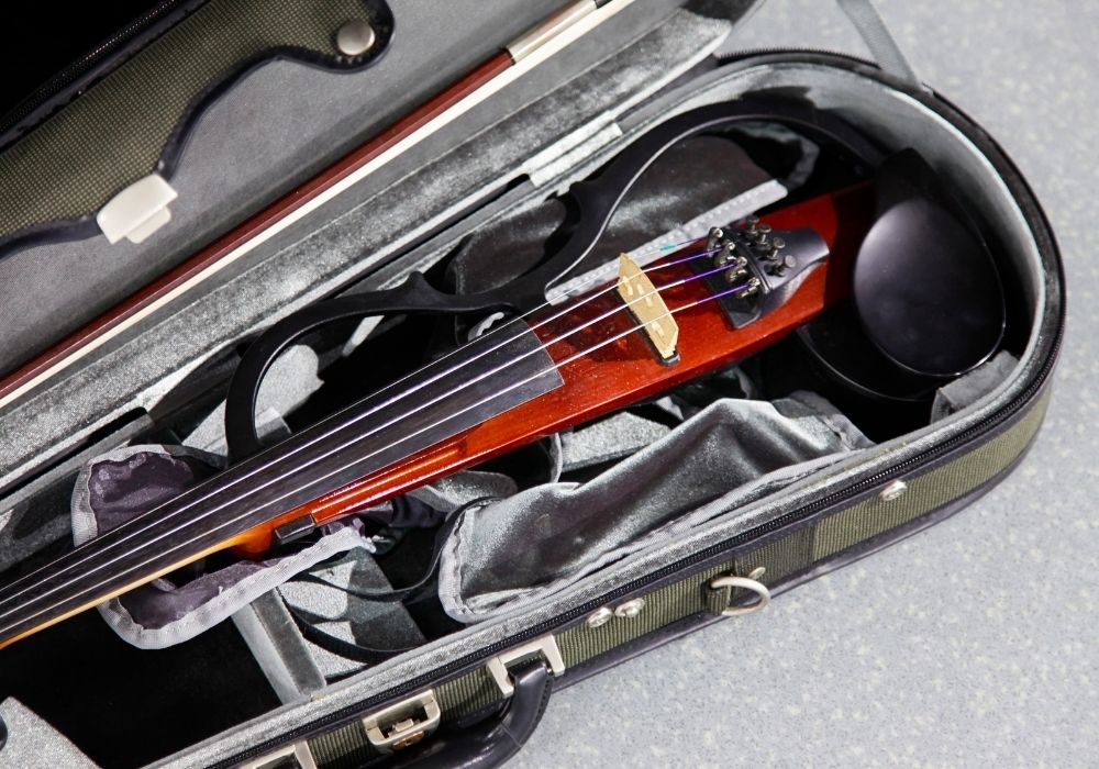 An electric violin inside the box