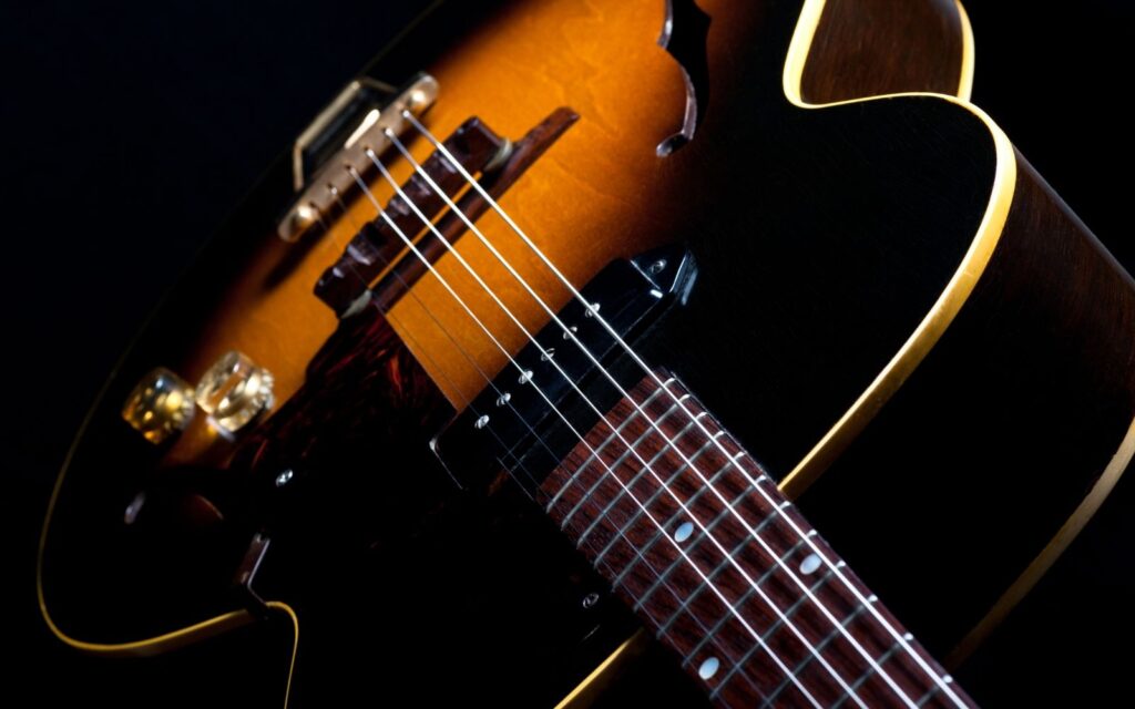 Close up of an acoustic electric guitar