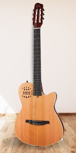 Godin ACS-SA Nylon String Acoustic Electric on a wood floor with a white wall as the background