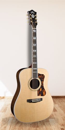 Guild D-55 Acoustic Guitar on hardwood floor