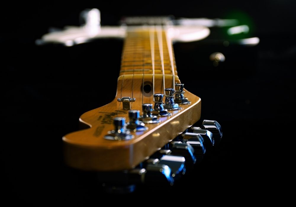 A close up of an fender electric guitar