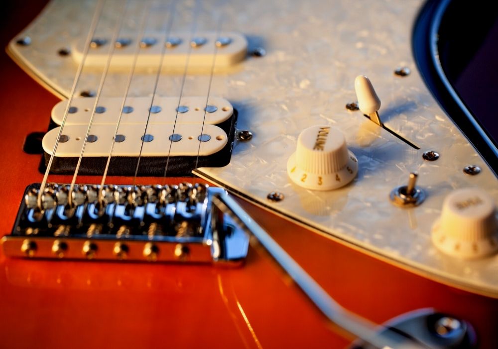 a close up of an electric guitar pickup