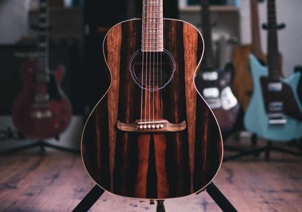 a closeup fender acoustic guitar
