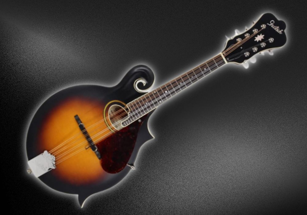 A Gretsch G9350 mandolin with a white outline on a black background.